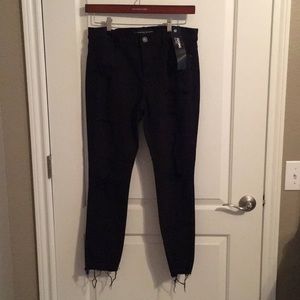 NWT Black Distressed mid rise jeggings